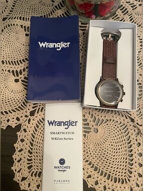 Wrangler WRZ20 Series smartwatch with a bronze tone case and brown leather band